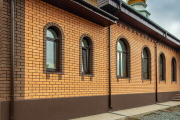 Temple of Seraphim of Sarov against a cloudy sky.