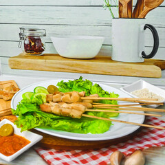 Taichan satay is a traditional food from Jakarta consisting of grilled chicken satay without soy sauce and peanut sauce