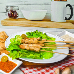 Taichan satay is a traditional food from Jakarta consisting of grilled chicken satay without soy sauce and peanut sauce
