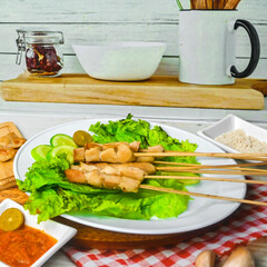 Taichan satay is a traditional food from Jakarta consisting of grilled chicken satay without soy sauce and peanut sauce