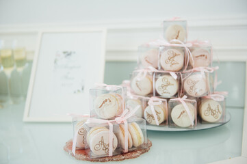 Delicious pink macaroons for guests. wedding ceremony