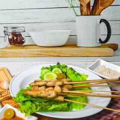 Taichan satay is a traditional food from Jakarta consisting of grilled chicken satay without soy sauce and peanut sauce