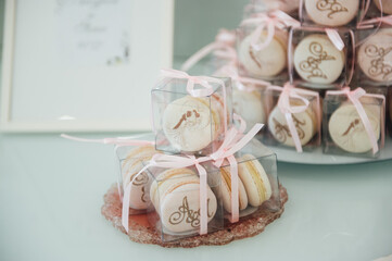 Delicious pink macaroons for guests. wedding ceremony