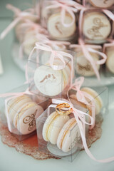 Delicious pink macaroons for guests. wedding ceremony