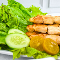 Taichan satay is a traditional food from Jakarta consisting of grilled chicken satay without soy sauce and peanut sauce