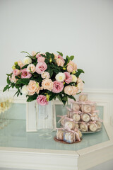 Delicious pink macaroons for guests. wedding ceremony