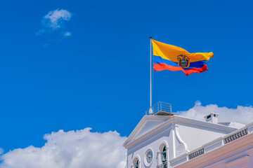 The Ecuadorian flag flying above the presidential palace in Quito, Ecuador