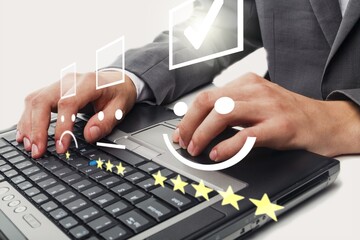Smile happy business face icon on business women working on laptop background.