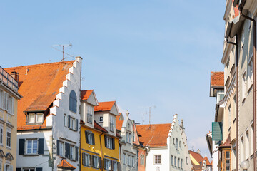 Obraz premium Houses and streets with historic residential facades in the Bavarian port city of Lindau on Lake Constance