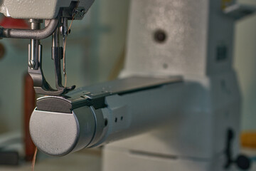 Sewing machine for watering heavy materials