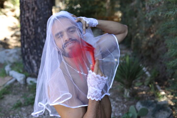 Proud gender fluid man representing diversity and freedom in bridal shoot 