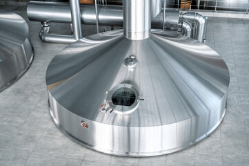 Mash vats of a brewery. Large metal fermentation tanks
