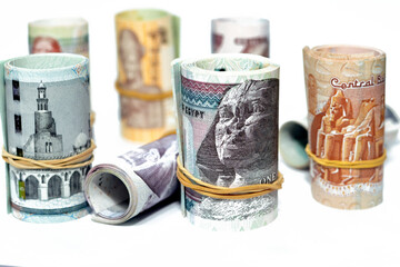 Egypt money roll pounds banknotes isolated on white background, Egyptian pounds cash money bills...