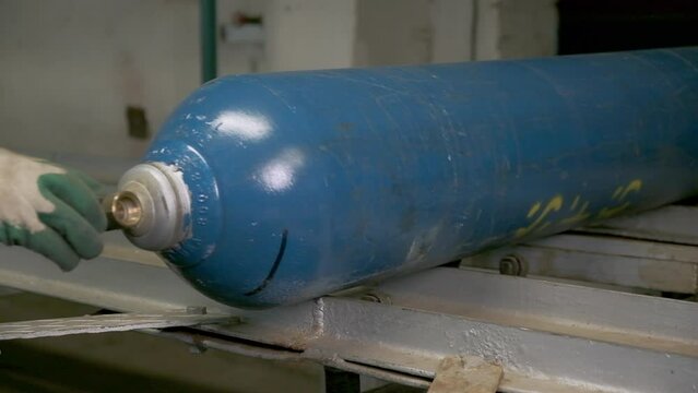 Equipment at the factory. Clip. A large room with huge bolons of gas that move and lie on top of each other.