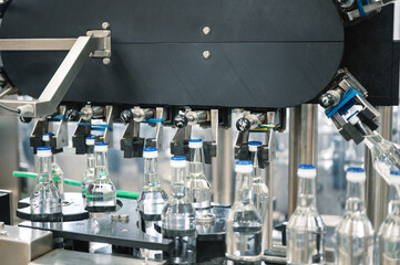visual inspection of bottles with vodka