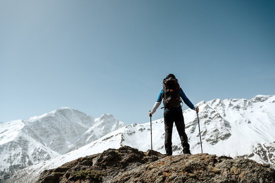 Climber Looks Up The Mountain