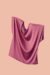 Studio shot of floating simple wide blouse