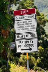 Restricting road sign at the entrance of the Waipi'o Valley in the north of Big Island in Hawaii - Road only permitted to 4-wheel drive vehicles
