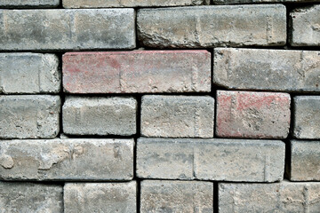 stacked old brick, close up as texture for background
