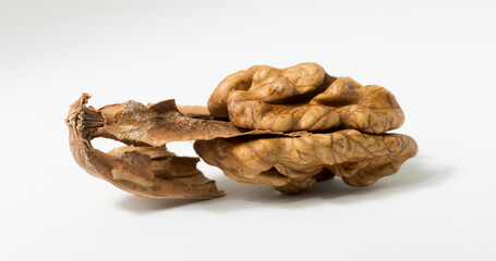 Walnuts are rounded, single-seeded stone fruits of the walnut tree. Walnut kernel and partitions.