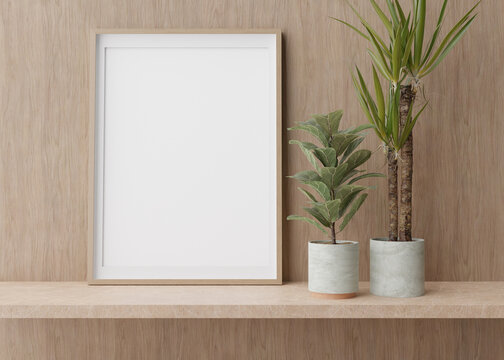 Empty vertical picture frame standing on shelve in modern room. Mock up interior in contemporary style. Free, copy space for picture. Plants. 3D rendering.