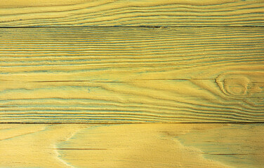 Yellow background of wooden boards with preservation of texture