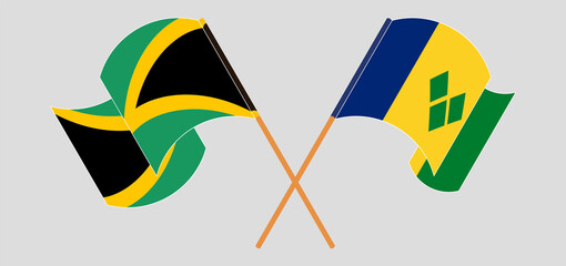 Crossed and waving flags of Jamaica and Saint Vincent and the Grenadines