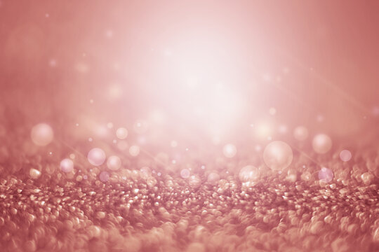 abstract rose gold background with shiny backdrop texture. Stock