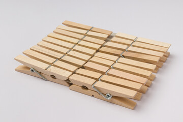 set of wooden clothespins isolated on white background