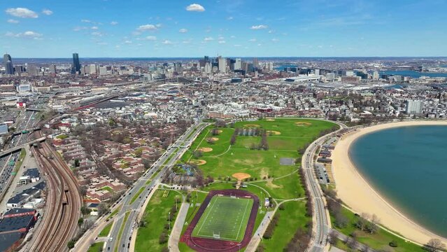 Boston Downtown Financial District aerial view in spring from South Boston, Massachusetts MA, USA. 