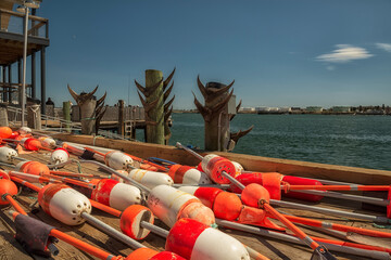 Pier on the bay. Fishing floats. USA. Maine. Portland. © Ann Stryzhekin
