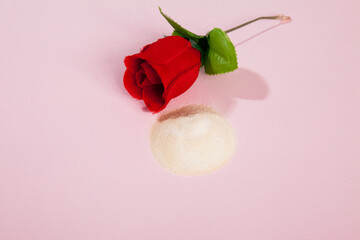 Collagen powder on pink background.