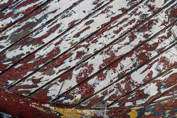 Unpainted wood with various colors and a lot of texture, good as a background.