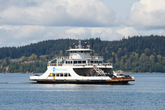 Steilacoom, WA, USA - April 23, 2022;  Pierce County Small Car Ferry Christine Anderson Crossing Puget Sound On A Partly Sunny Day