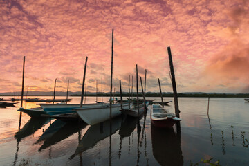 Boats moored in the river in late afternoon in Santiago do Iguape in Bahia
