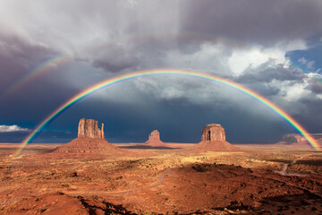 Rainbow over the Mittens in Monument Valley