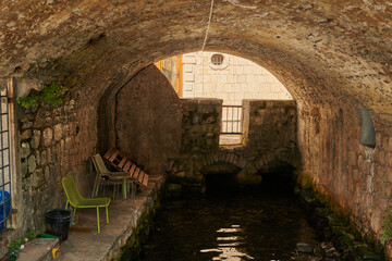 narrow flooded basement stone arched in montenegro