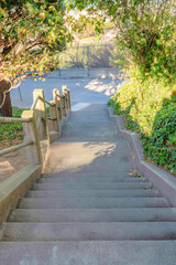 Perspective view of a straight concrete outdoor staircase in San Francisco, California