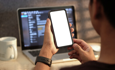 Cropped shot businessman using smart phone at workplace.