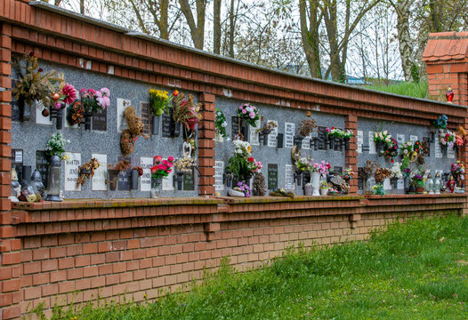 the wall where the urns of the cremated people are buried in the cemetery of the city of Pecs - Hungary