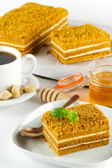 Tasty dessert honey cake. Slice of sweet homemade layered honey cake.