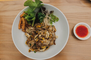 Pad See Ew is a stir-fried noodle dish that is commonly eaten in Thailand.