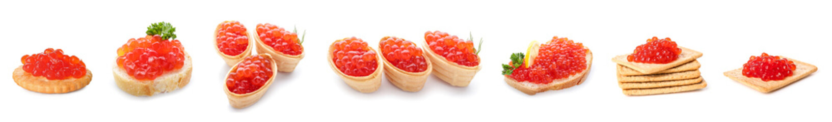 Different snacks with delicious red caviar on white background