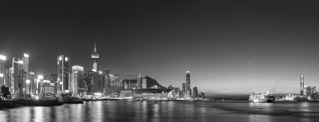 Fototapeta na wymiar Panorama of Victoria Harbor in Hong Kong at dusk