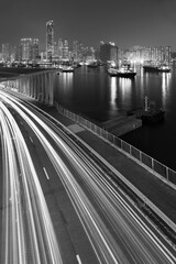 Fototapeta premium Night scenery of harbor and highway in Hong Kong city