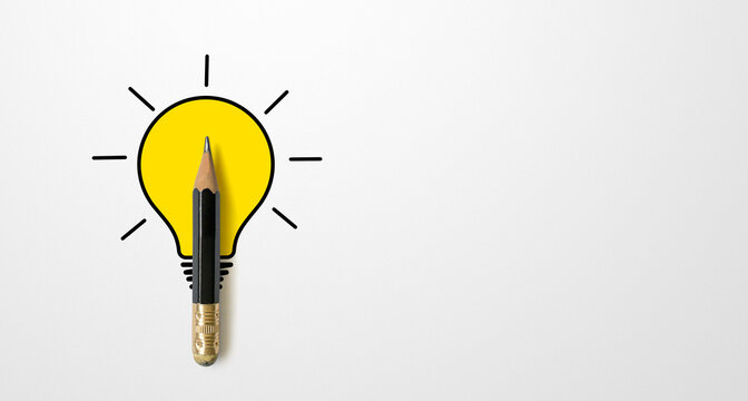 Black colour pencil with outline light bulb and word idea on white paper background. Creativity inspiration ideas concept