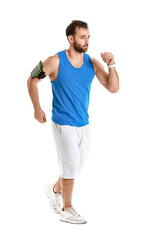 Sporty male runner on white background