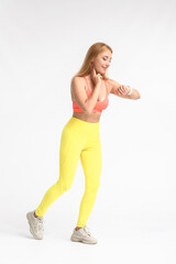 Naklejka premium Female runner checking pulse on light background