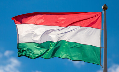 Naklejka na ściany i meble the Hungarian flag fluttering in the wind