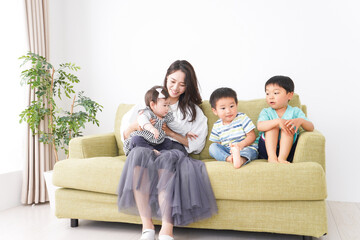 Children playing happily with family